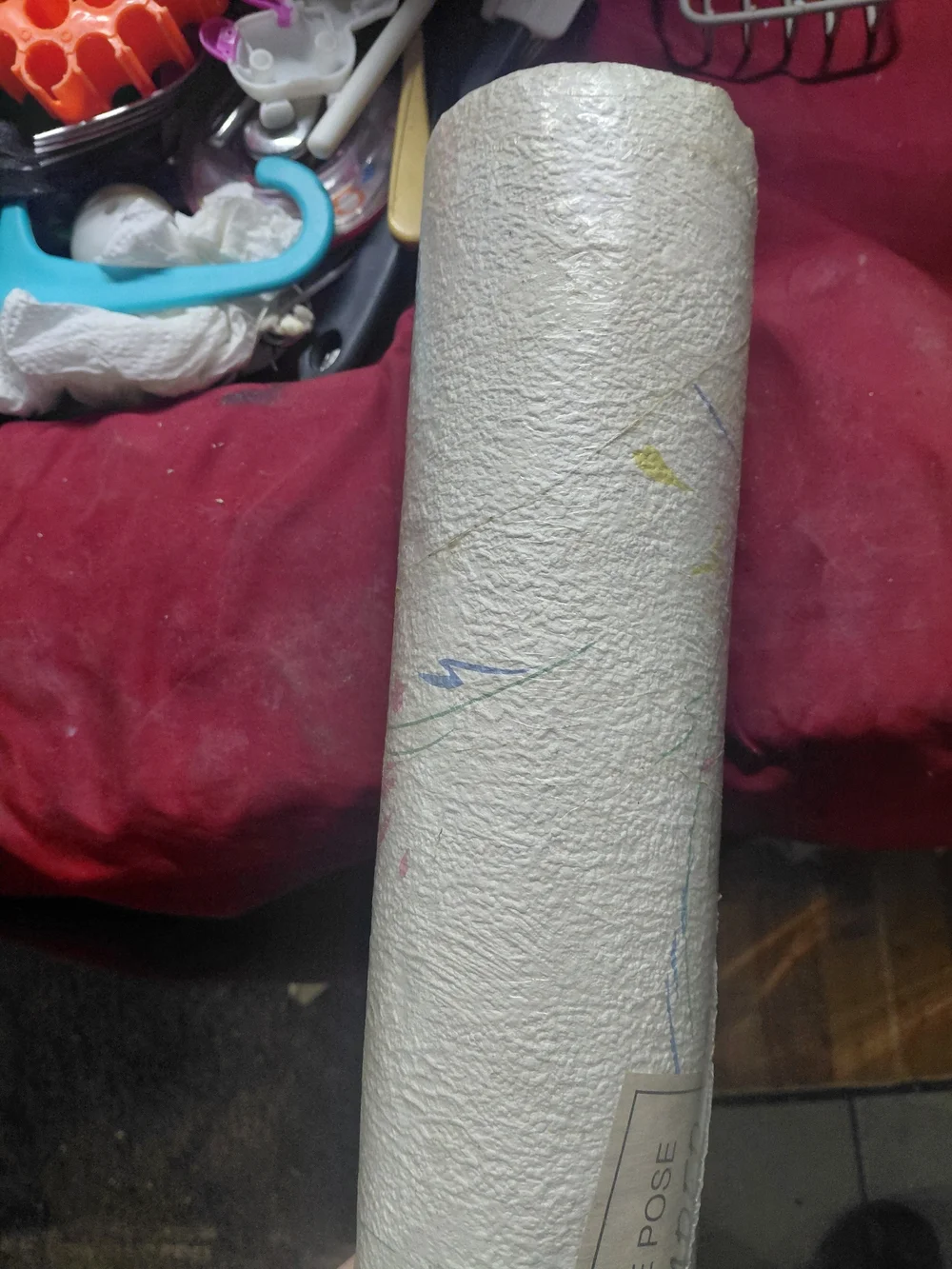 double roll of pre-pasted, strippable wallpaper, specifically identified as the